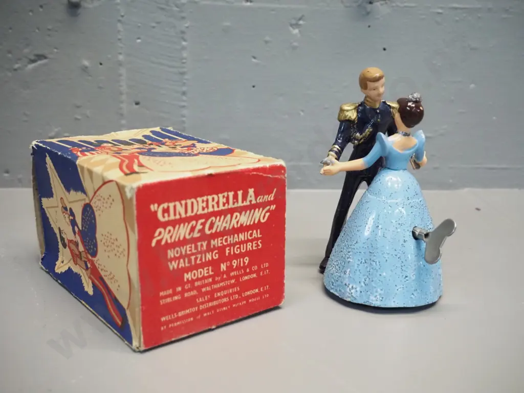 vintage A. Wells & Co London Cinderella and Prince Charming wind-up mechanical dancing toy with original box H-130 - in Image 1++
