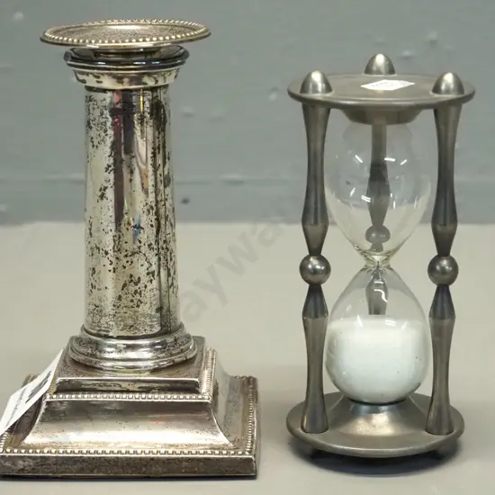 weighted sterling silver candlestick H-140 and a Royal Holland pewter egg timer