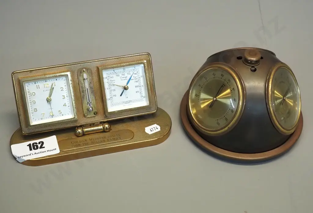 brass desktop items - rotating 3-dial barometer-thermometer and a clock/thermometer/barometer with 1955 engraving Image 1++