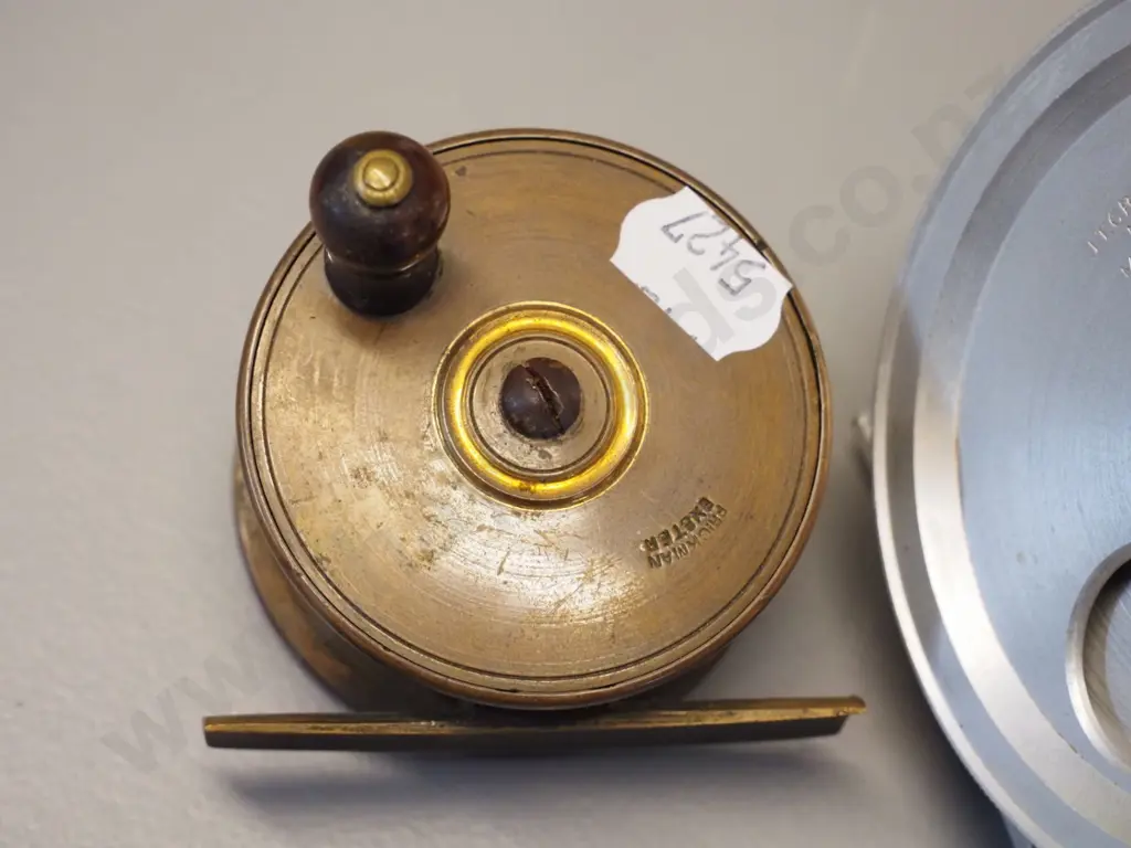 2 fly fishing reels - larger aluminium one marked JT Crouch Sons Melbourne D90, smaller brass marked Prickman Exeter Image 1++