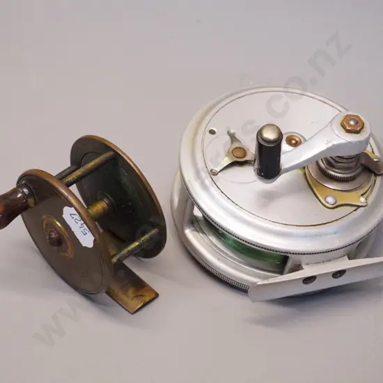 2 fly fishing reels - larger aluminium one marked JT Crouch Sons Melbourne D90, smaller brass marked Prickman Exeter