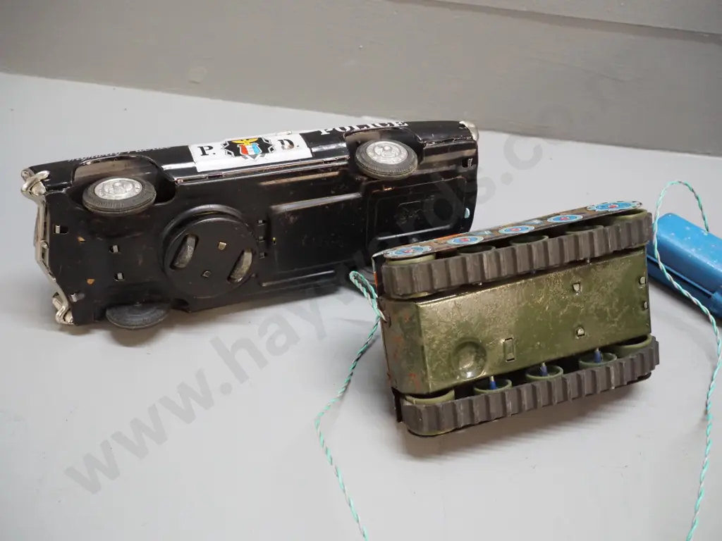 2 battery operated tin toy vehicles - Banda Japan police car H90 L280 & tank with wired remote control - both untested, Image 1++
