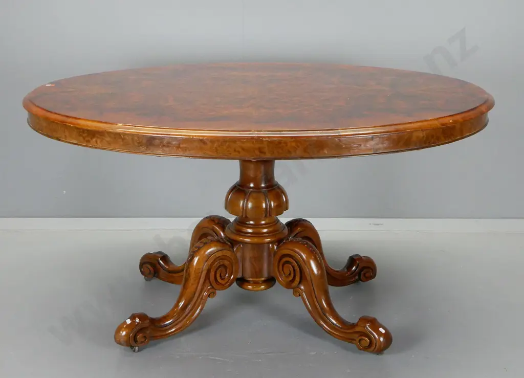 antique walnut dining table w/ heavily carved pedestal base, oval burr walnut top has minor scratching H720 L1360 D1040 Image 1++