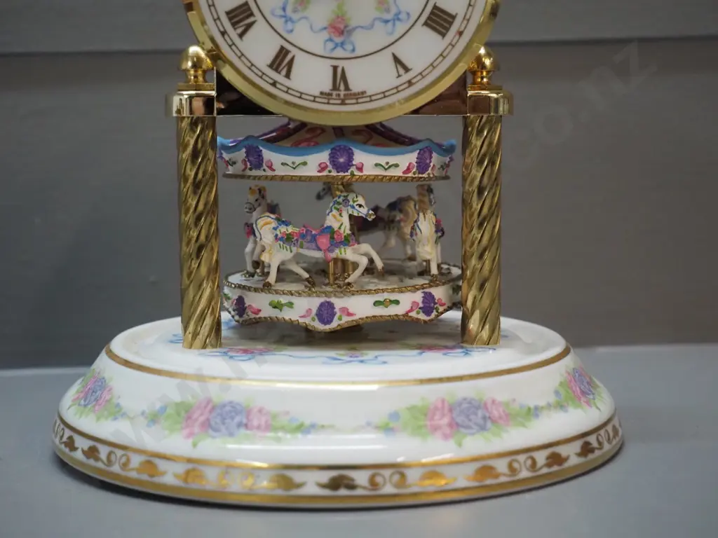 floral motif porcelain and plastic anniversary clock with glass dome, quartz movement H180 D140 Image 1++