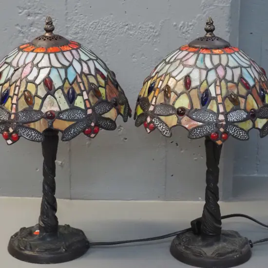 pair of reproduction Tiffany style dragonfly motif table lamps - some paint wear on cast metal bases. H-420