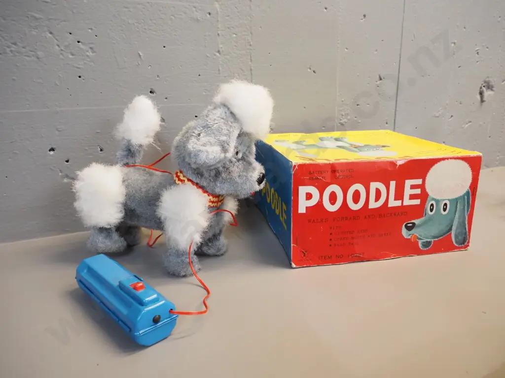 battery operated tin toy poodle and wired remote control, untested but battery compartment is clean H-220 L-230 Image 1++
