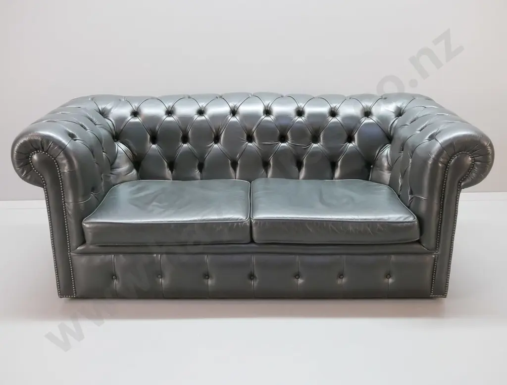 deep-button studded very dark green leather 2-seater chesterfield with loose seat cushions H-750 W-1830 D-820 Image 1++