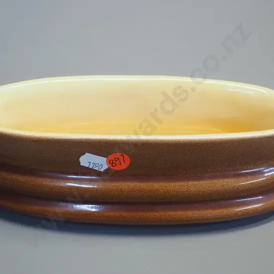 O.C. Stephens trough vase - brown with yellow interior H-70 L-210