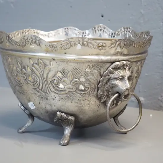silver plated brass pierced and pressed footed bowl with lion's head handles - minor damage, slightly bent H-170 L-280