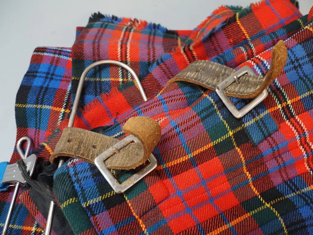 kilt and matching neck-tie - kilt is L-600. Some wear to leather traps and corrosion to buckles Image 1++