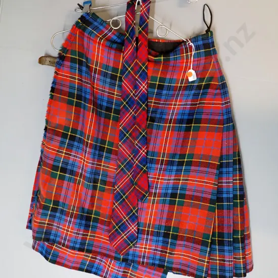 kilt and matching neck-tie - kilt is L-600. Some wear to leather traps and corrosion to buckles