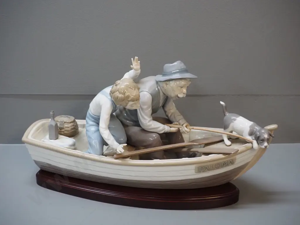Lladro large figure of boat with man and boy fishing, on wooden stand, damage to fishing rod & boys hand H-220 L-400 Image 1++