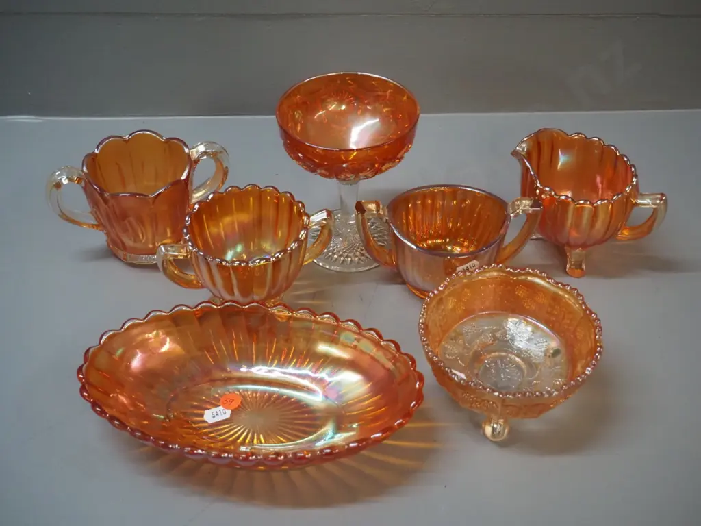 7 pieces of marigold carnival glass - 4 small bowls, stemmed comport, jug, oval dish Image 1++