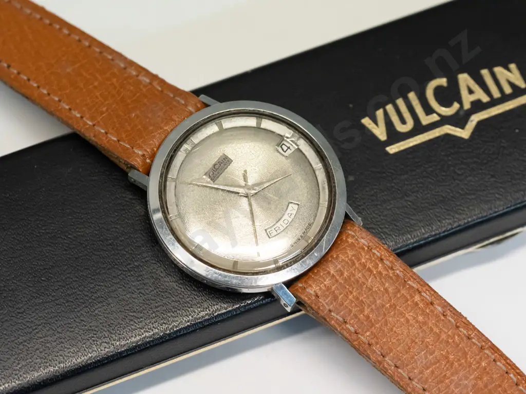 boxed Vulcain watch has day & date, has no winder, code on back   3363000 Image 1++