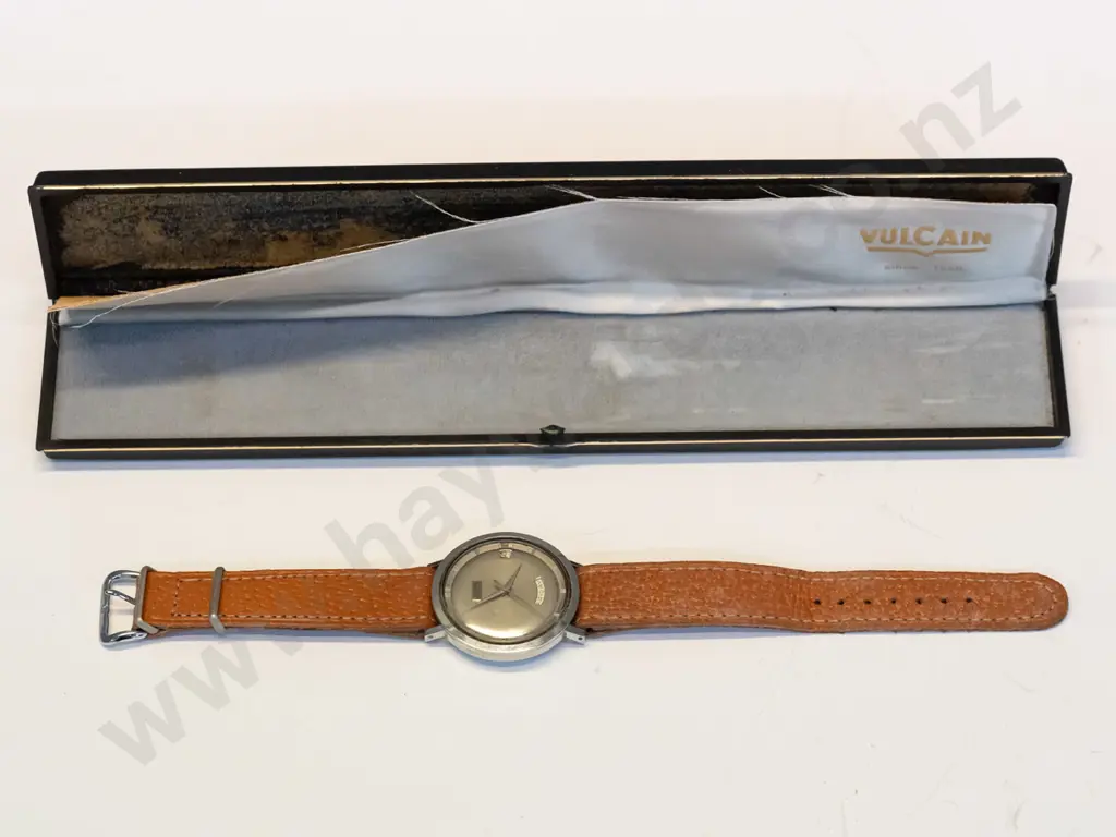 boxed Vulcain watch has day & date, has no winder, code on back   3363000 Image 1++