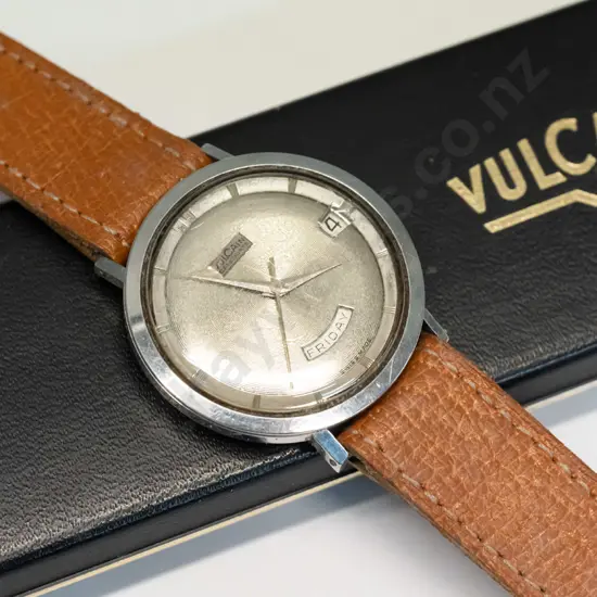 boxed Vulcain watch has day & date, has no winder, code on back   3363000