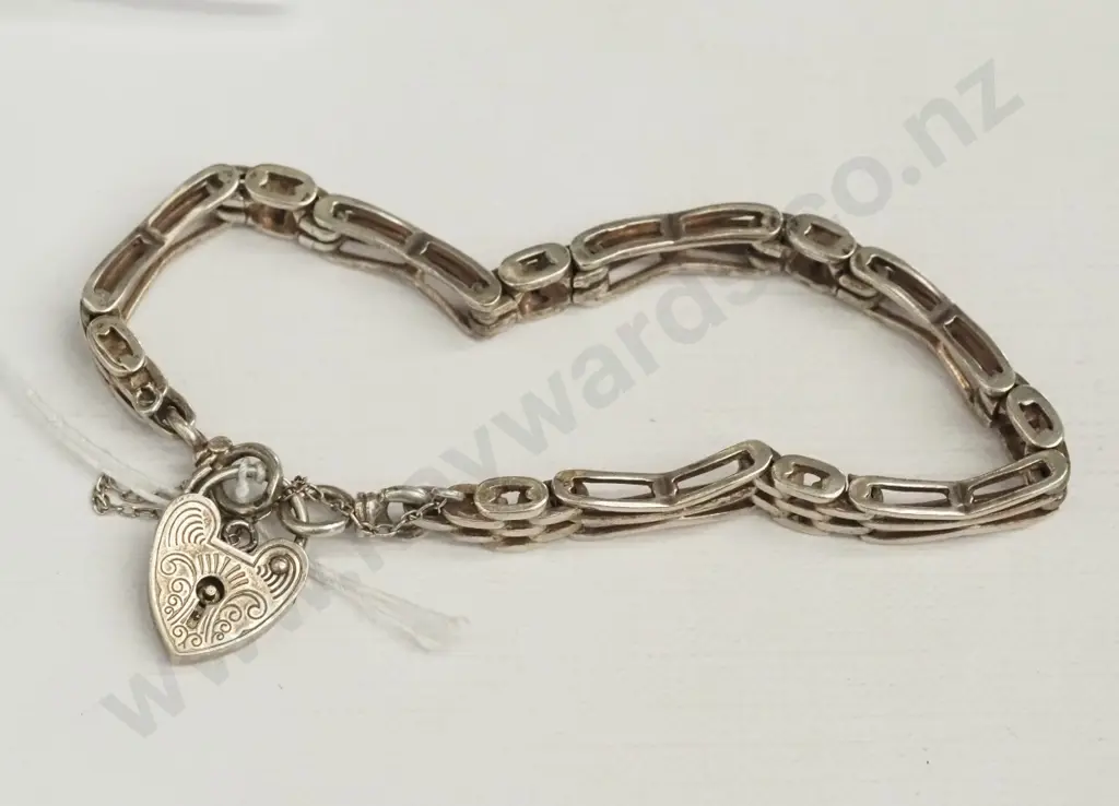 silver link bracelet with heart clasp - safety chain broken - stamped sterling silver Image 1++