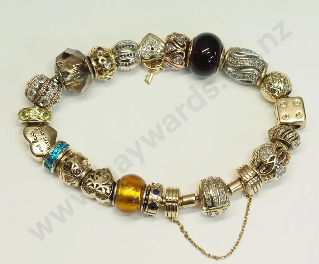 Modern 10ct yellow gold Michael Hill / Emma & Roe charm bracelet with safety chain, length 20cm - valuation in office Image 1++
