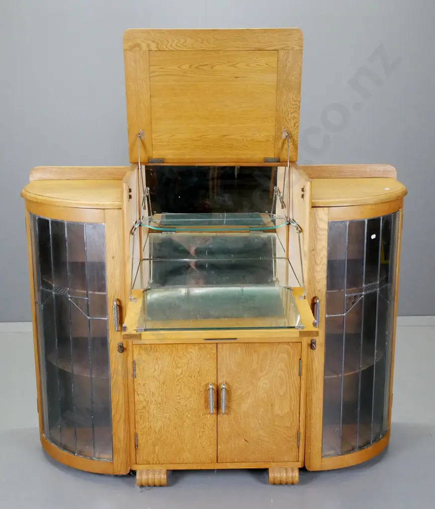 deco oak display / cocktail cabinet with 2 leadlight doors, fold out mirrored serving flap, drawer - some desilvering Image 1++