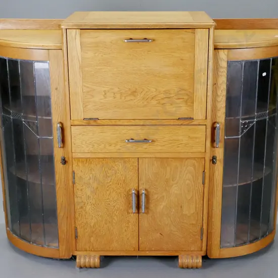 deco oak display / cocktail cabinet with 2 leadlight doors, fold out mirrored serving flap, drawer - some desilvering