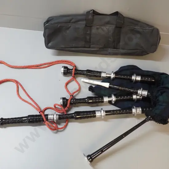 set of bagpipes in black carry bag