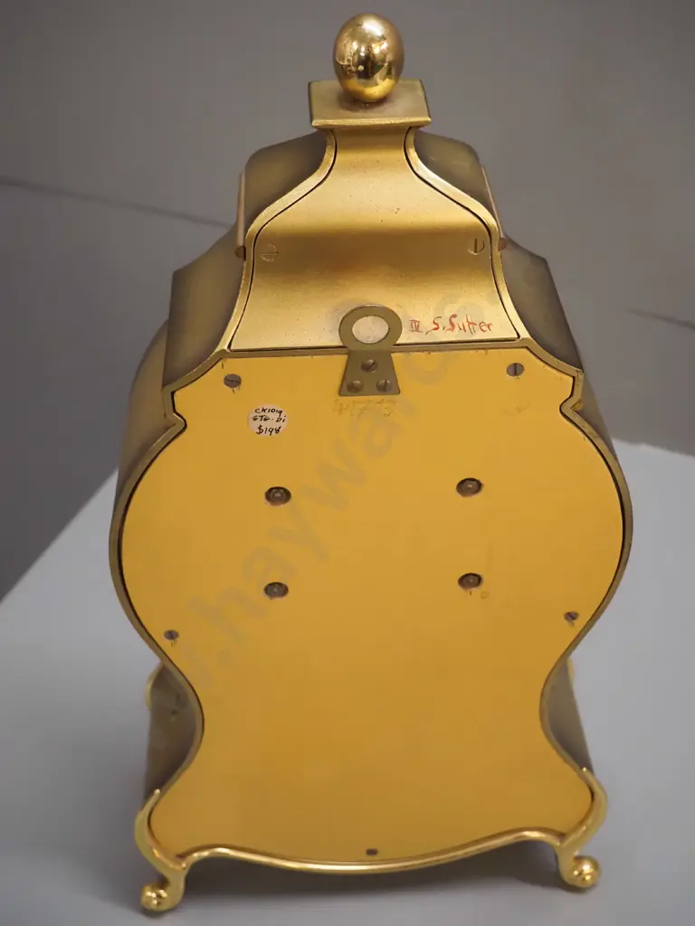 Eluxa pendulum mantel clock in brass and gold finish timber case with hand-painted decoration signed S. Sutter, no Image 1++