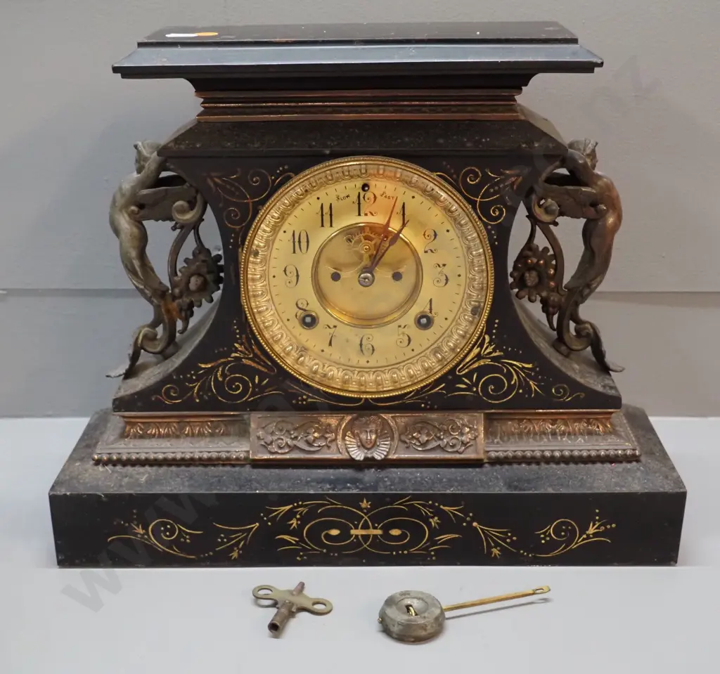 vintage metal cased Ansonia mantel clock w/ spelter figural decoration & metal moulding - some pitting & loss of finish Image 1++