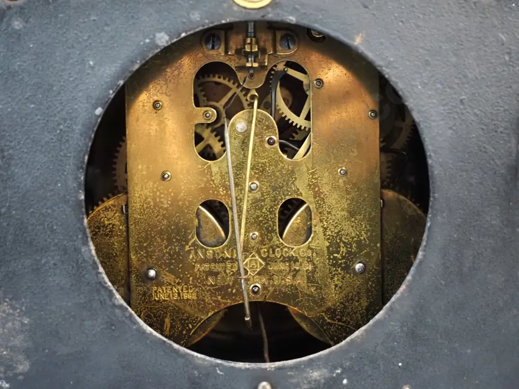 vintage metal cased Ansonia mantel clock w/ spelter figural decoration & metal moulding - some pitting & loss of finish Image 1++
