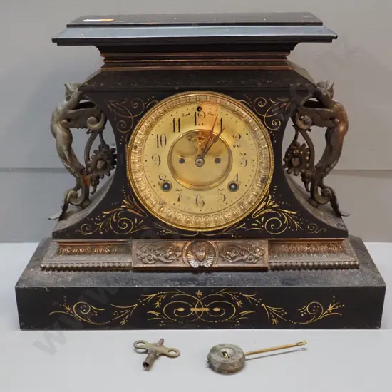 vintage metal cased Ansonia mantel clock w/ spelter figural decoration & metal moulding - some pitting & loss of finish