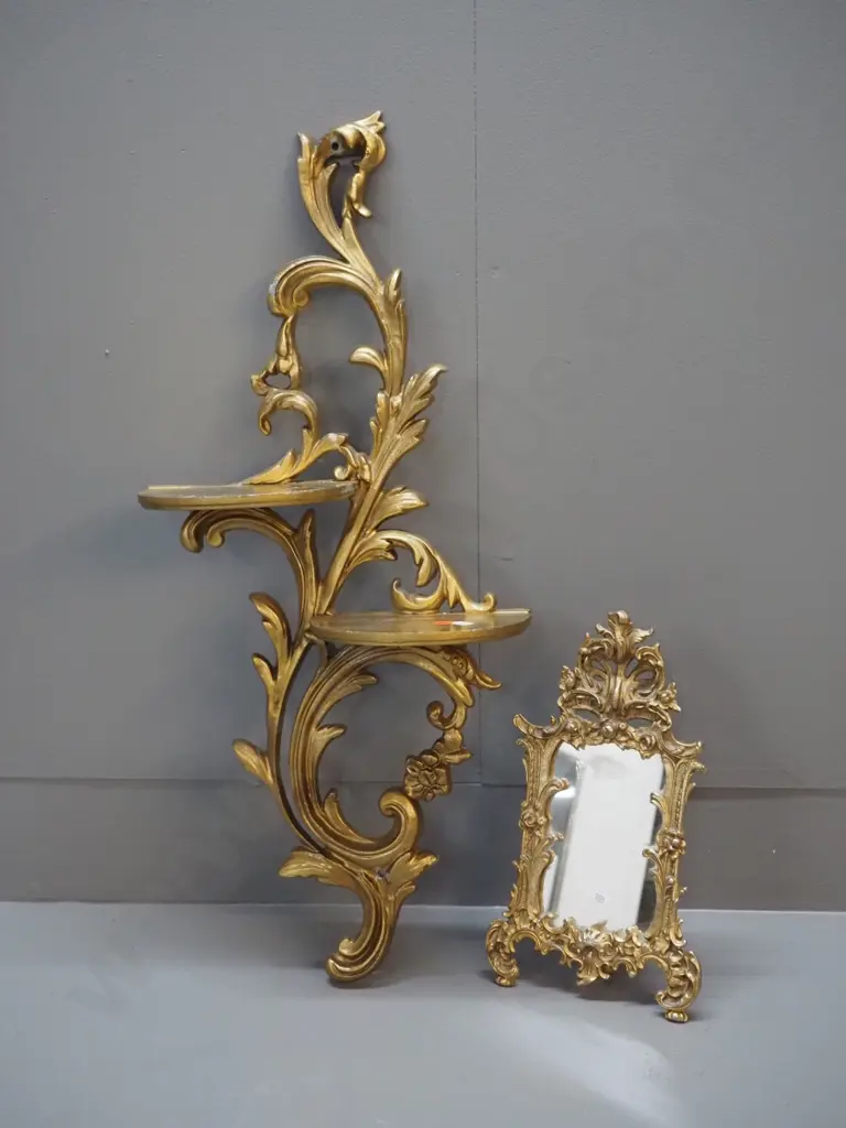 gilt finish cast metal items - mirror in ornate frame and a 2-tier wall shelf, some loss of finish H-650 W-300 Image 1++