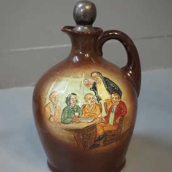 Royal Doulton Dickens Ware hand-painted relief pattern stoppered decanter "Mr. Pickwick Proposes a Toast" H-220 D-140