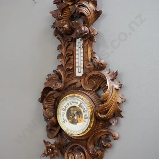 vintage German wall barometer-thermometer in ornately carved (walnut?) case. Minor damage to carved areas. H-630 W-300