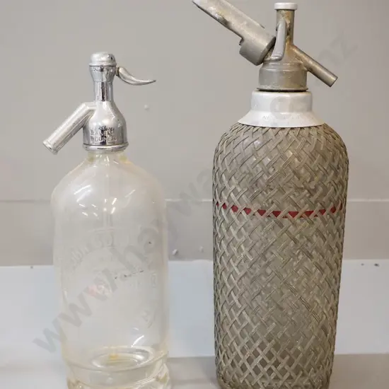 2 vintage soda syphons - John Gold & Sons Balclutha with Lane's Dunedin top, and a mesh-covered English size C. H-350