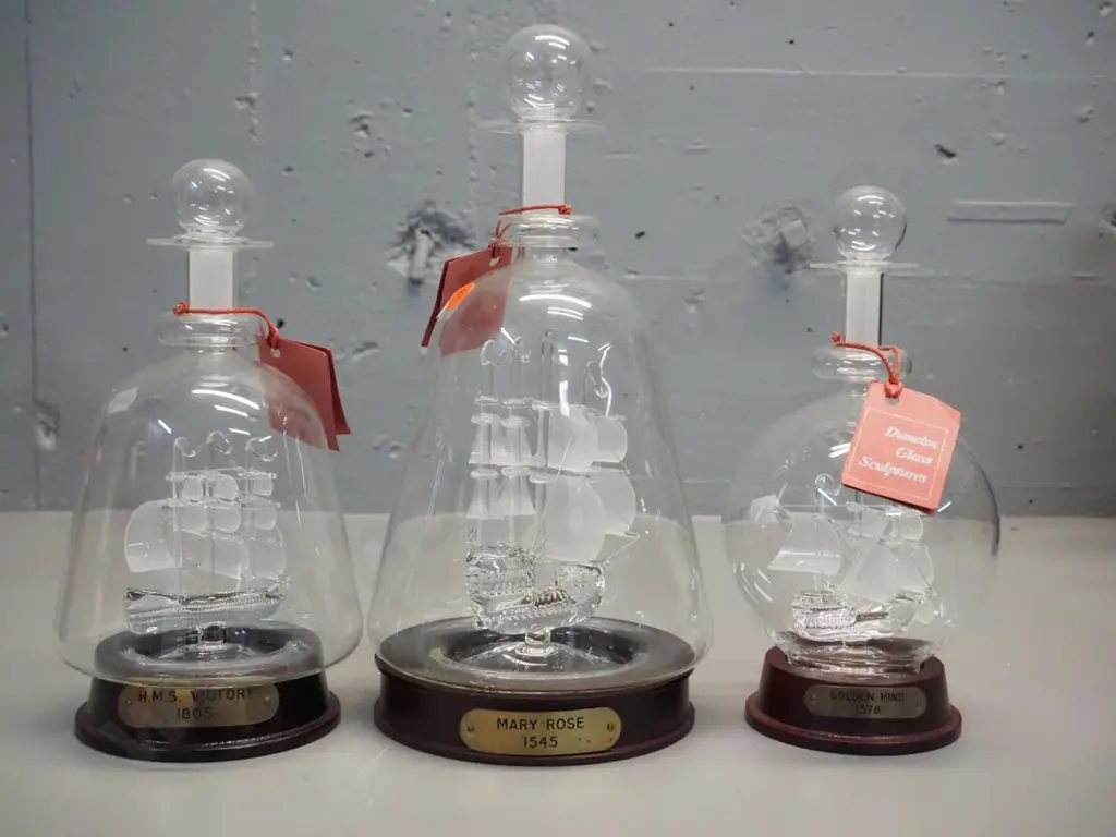 3 Dunelm glass ship sculptures in stoppered bottles with wooden stands Image 1++