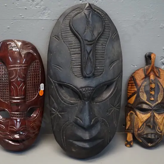 3 carved timber African wall masks - one marked Jambo Kenya. Tallest is H-380 W-170