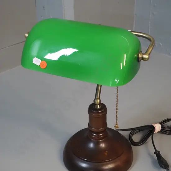 timber and brass finish based banker's lamp with green white-lined glass shade, pull cord - has 2-prong Euro style plug