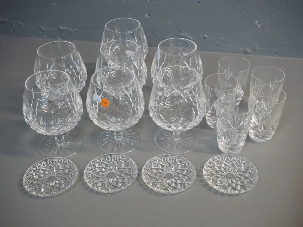 cut crystal items - 7 Waterford stemmed brandy glasses H130, one with chip to base, and 5 spirit glasses and 4 coasters Image 1++