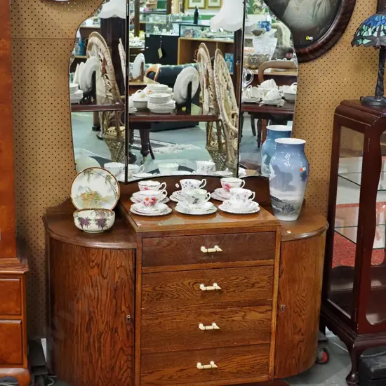 deco oak 4-drawer duchess with 2 half-round cupboards, bakelite handles, scalloped tilt & wing mirrors, key