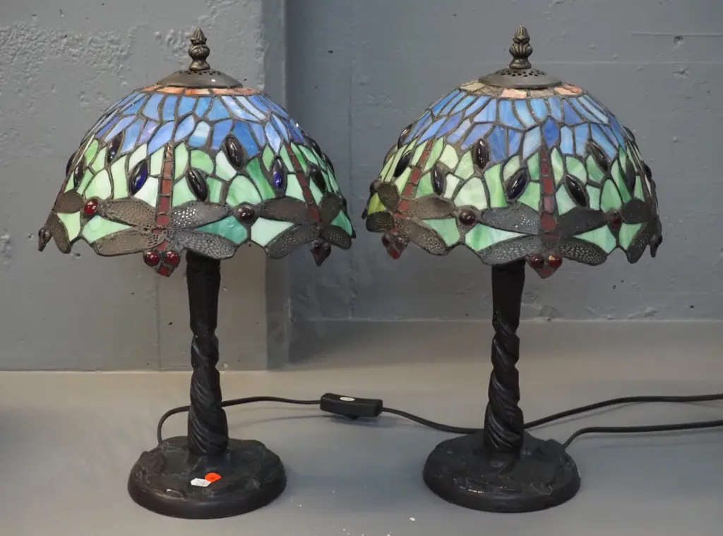 pair of reproduction Tiffany style dragonfly motif table lamps - some paint wear on cast metal bases. H-420 Image 1++
