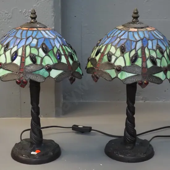 pair of reproduction Tiffany style dragonfly motif table lamps - some paint wear on cast metal bases. H-420