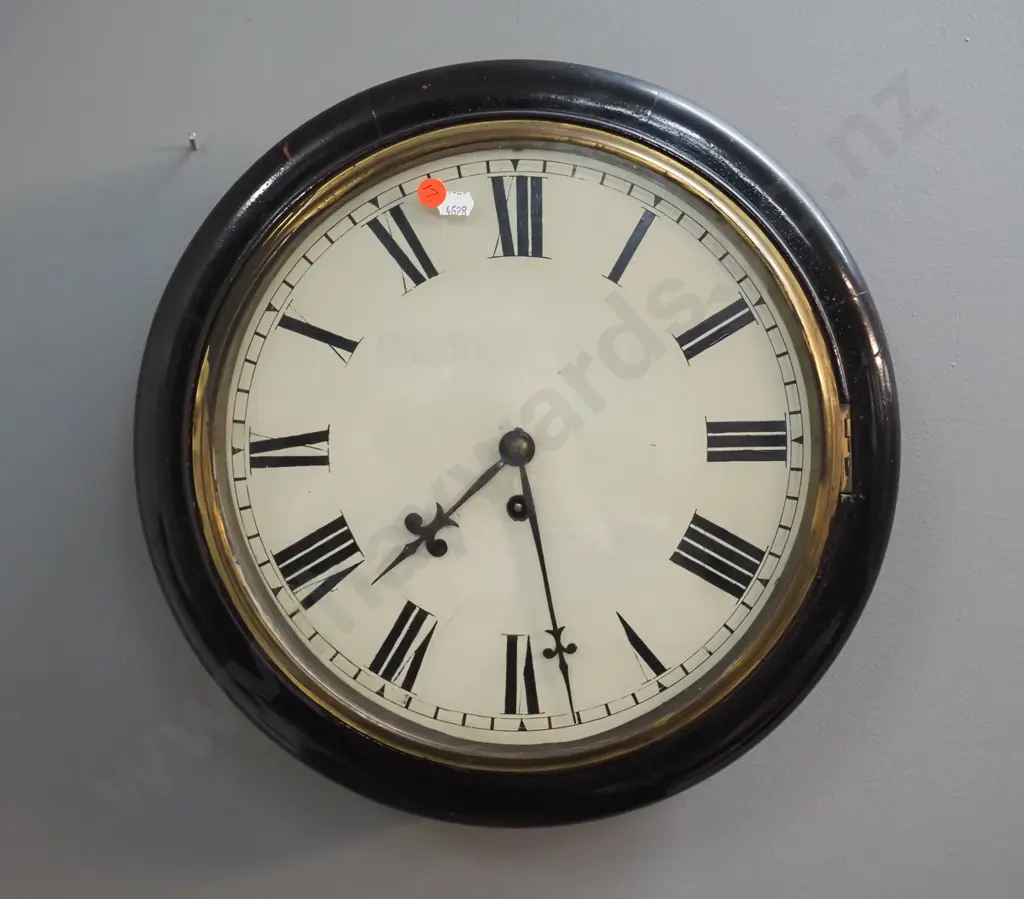 antique timber cased wall clock with brass bezel, with key, faded Peter Dick / Dunedin markings on face plus newspaper Image 1++