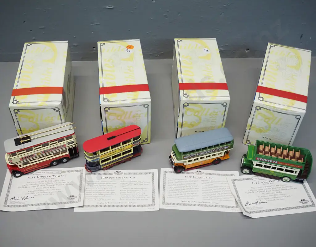 4 Matchbox Collectibles die-cast vehicles w/original boxes - 3 buses and a tram Image 1++