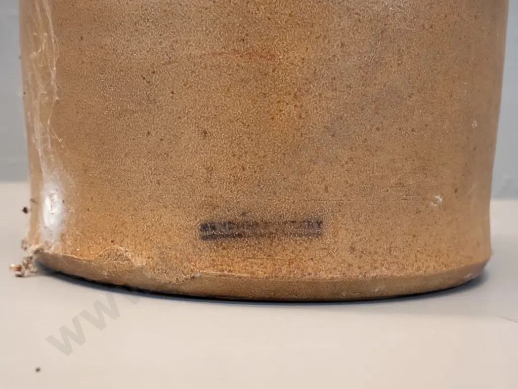 narrow-mouth crock with metal handle, marked R Powley & Co Dunedin 2669, chip to rim. No tap. H460 D220 Image 1++