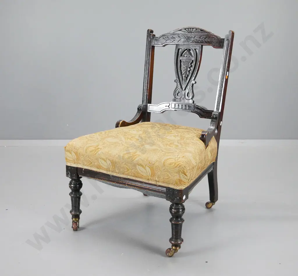 Edwardian dark-stained timber nursing chair w/gold patterned brocade, porcelain casters, rubbing to polish H800 Image 1++