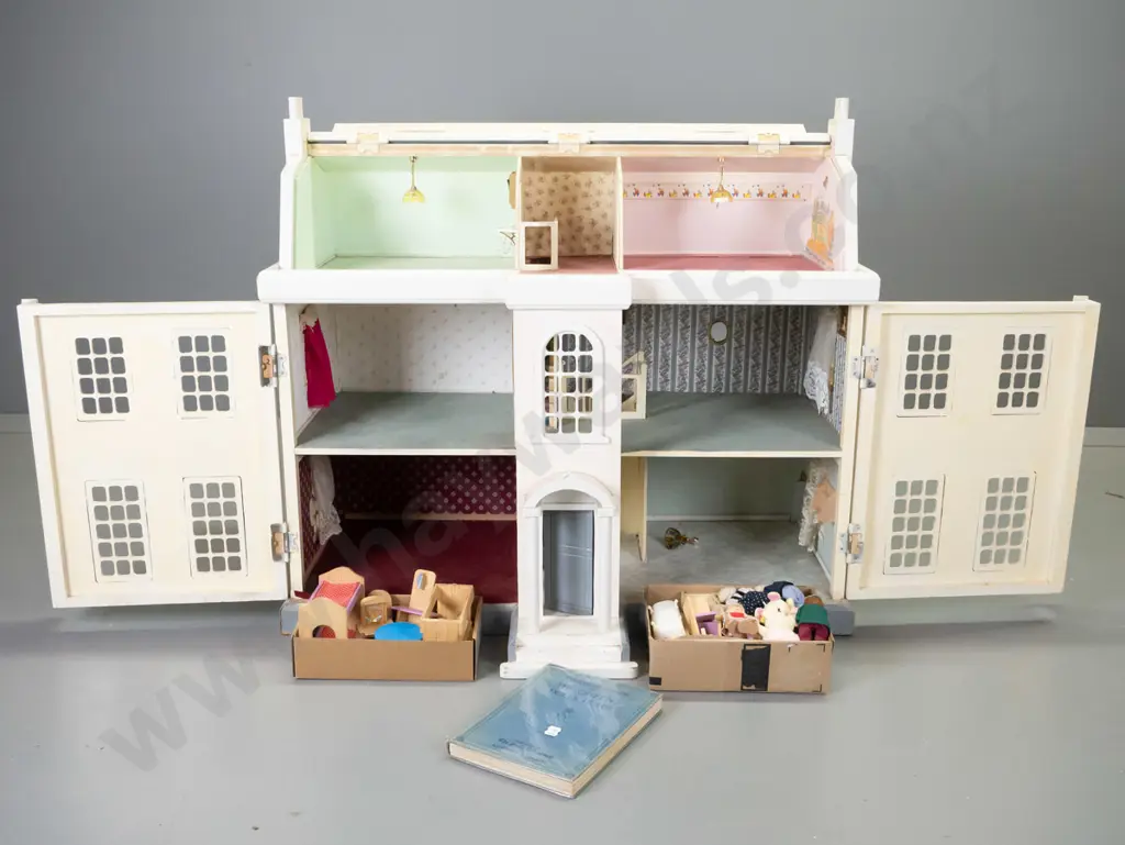 large Victorian style doll's house with fittings, curtains, wall decor, lamp shades, 3 hinged panels, plus book and some Image 1++