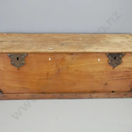 vintage large hardwood trunk with adzed top, brass filigree escutcheons, strapping, hinges & binding, forged iron