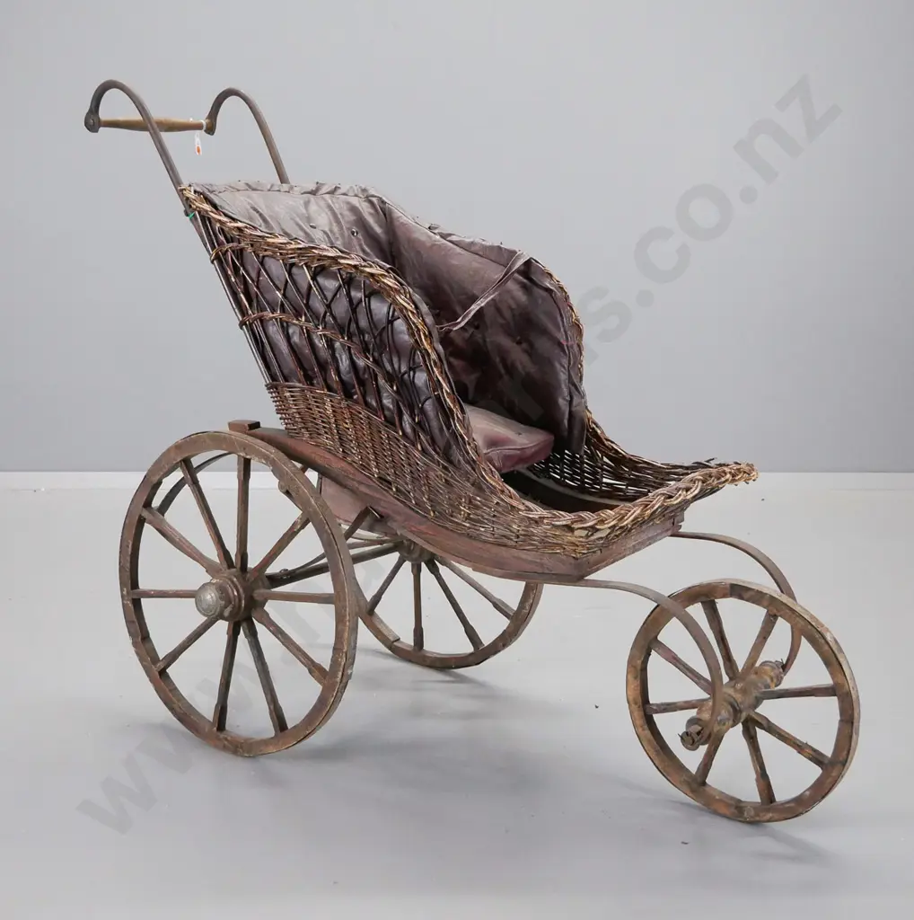 Victorian 3-wheeled pram - timber, woven cane and leatherette, timber wheels with metal strapping - overall wear & tear Image 1++