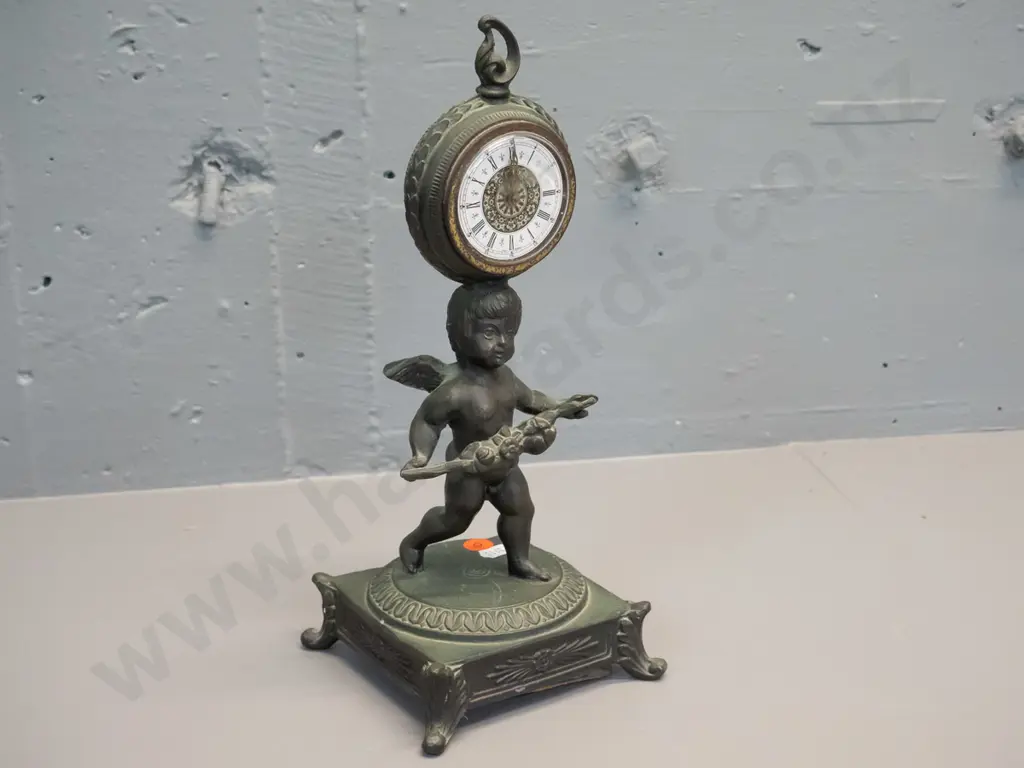 cast metal figural mantel clock with built-in winder - movement marked Germany H-300 Image 1++