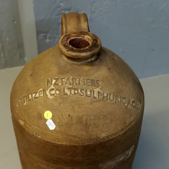 vintage narrow-mouth handled crock marked NZ Farmers Fertiliser Co. Ltd. Sulfuric Acid H-420 D-250