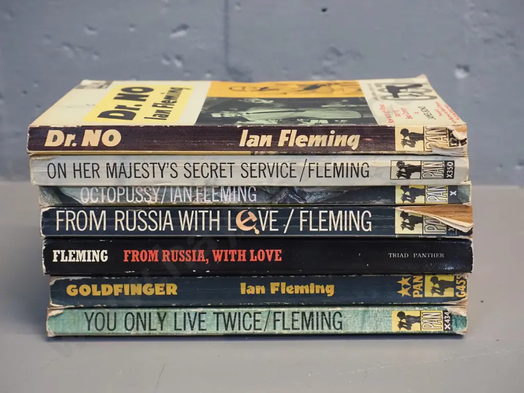 7 retro paperback editions of James Bond novels - earliest is 1964, general wear & minor damage Image 1++